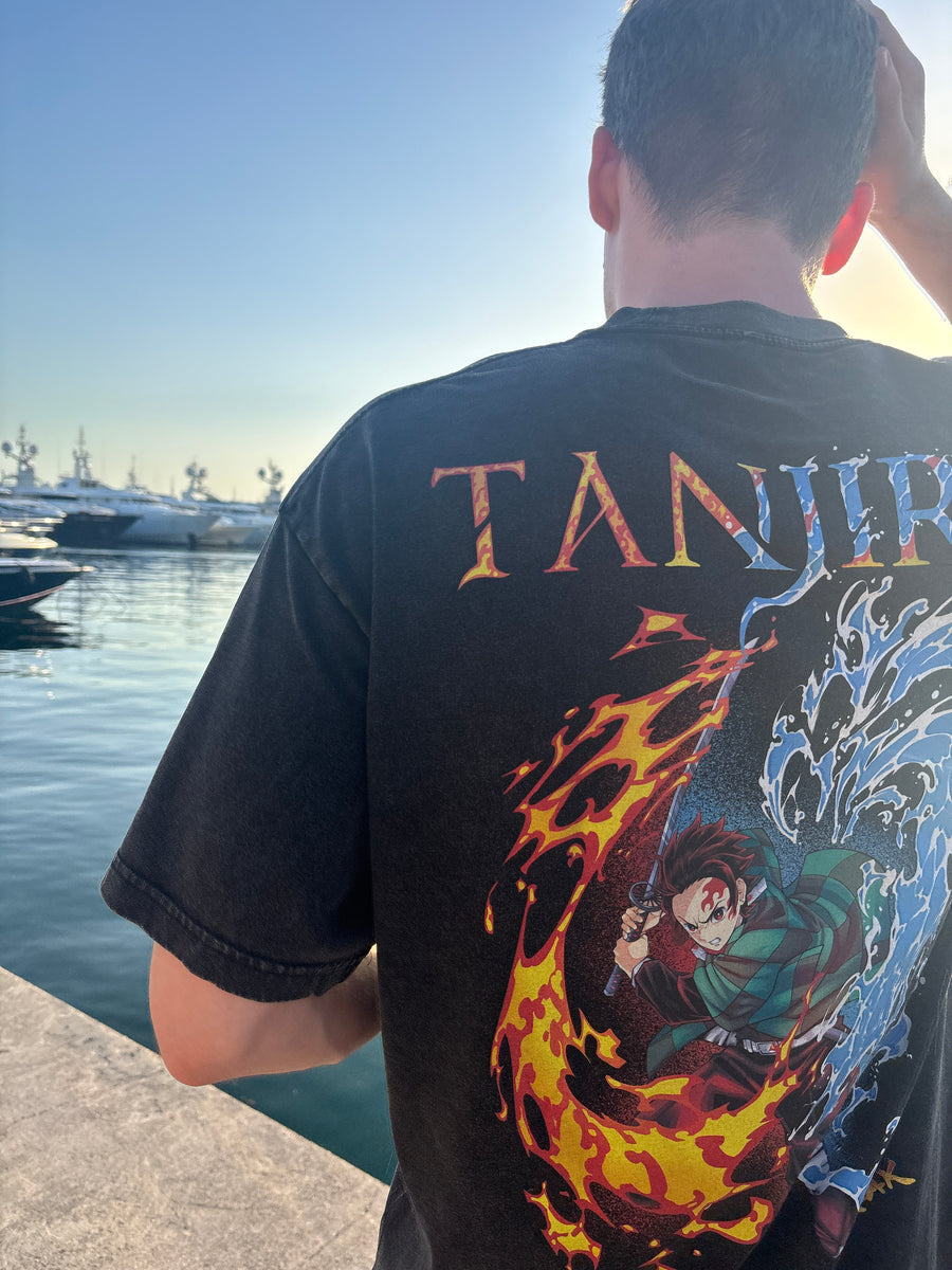 A fan wearing the TANJIRO SPLIT VINTAGE TEE