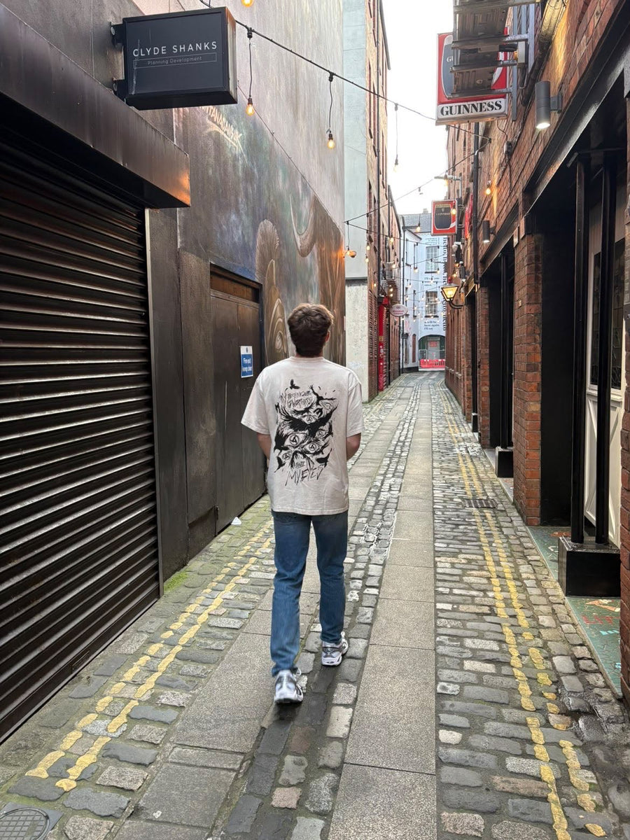A fan wearing the ITACHI TECHNIQUE TEE